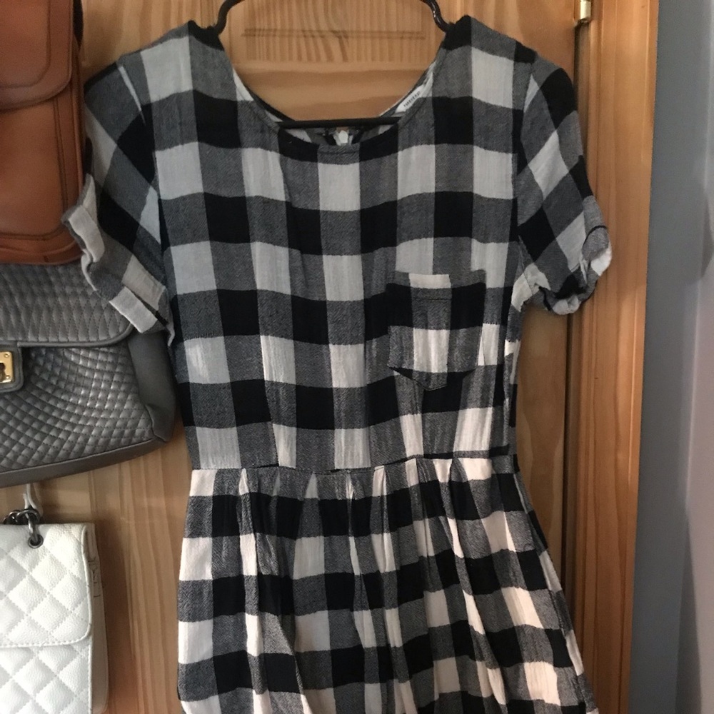 Plaid peplum top with pockets